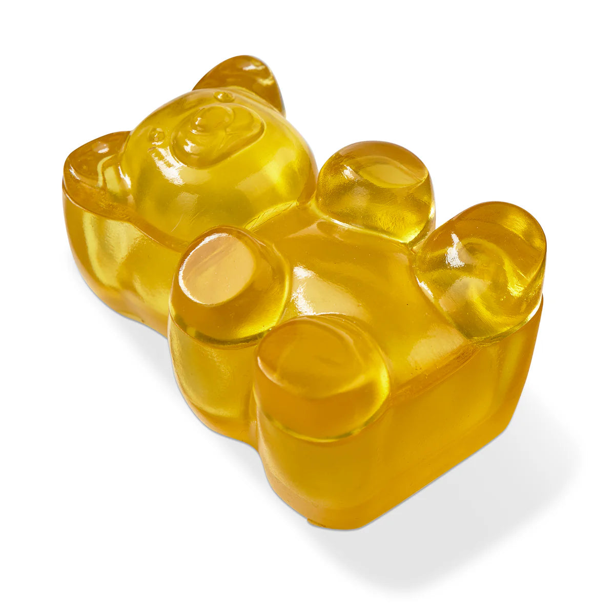 Clear yellow bear-shaped block on a white background